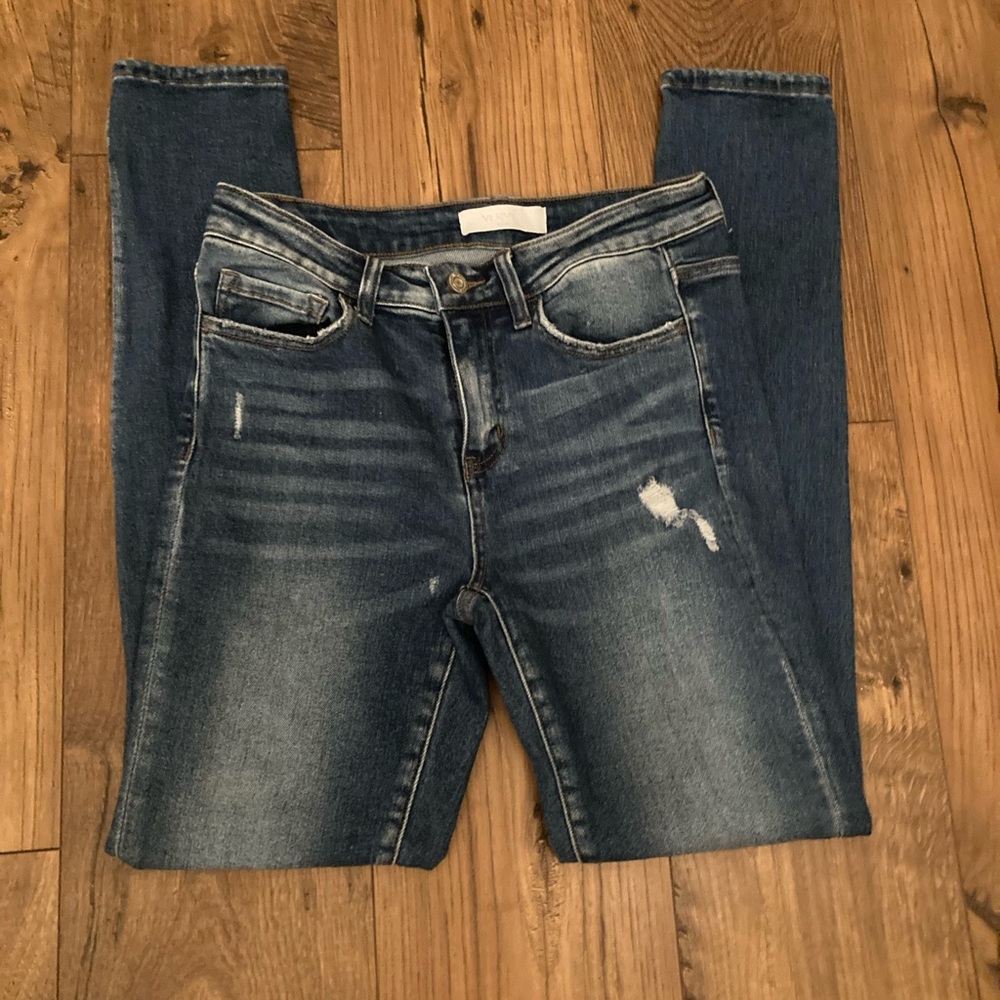 Boutique skinny jeans with distressing at the knees